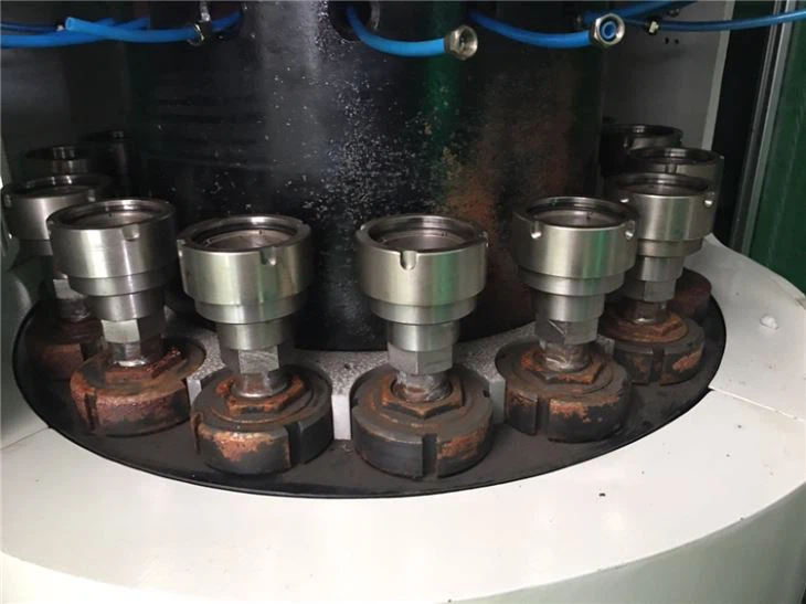 Plastic cap compression molding machine for water lids1